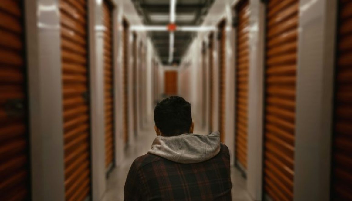 man inside secure storage unit